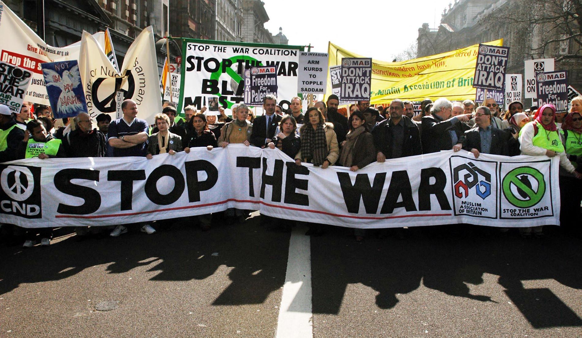 Anti-war protesters march down Whitehall in London, Britain, 22 March 2003, to demonstrate against the current military action on Iraq primarily by the British and United States governments (AFP)