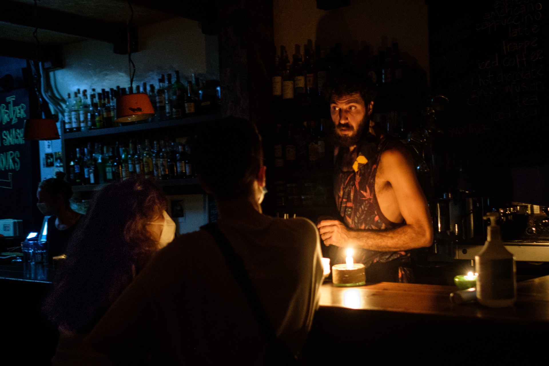Demo Bar operates by candlelight between electricity outages. July 7, 2021 (MEE/Rita Kabalan)
