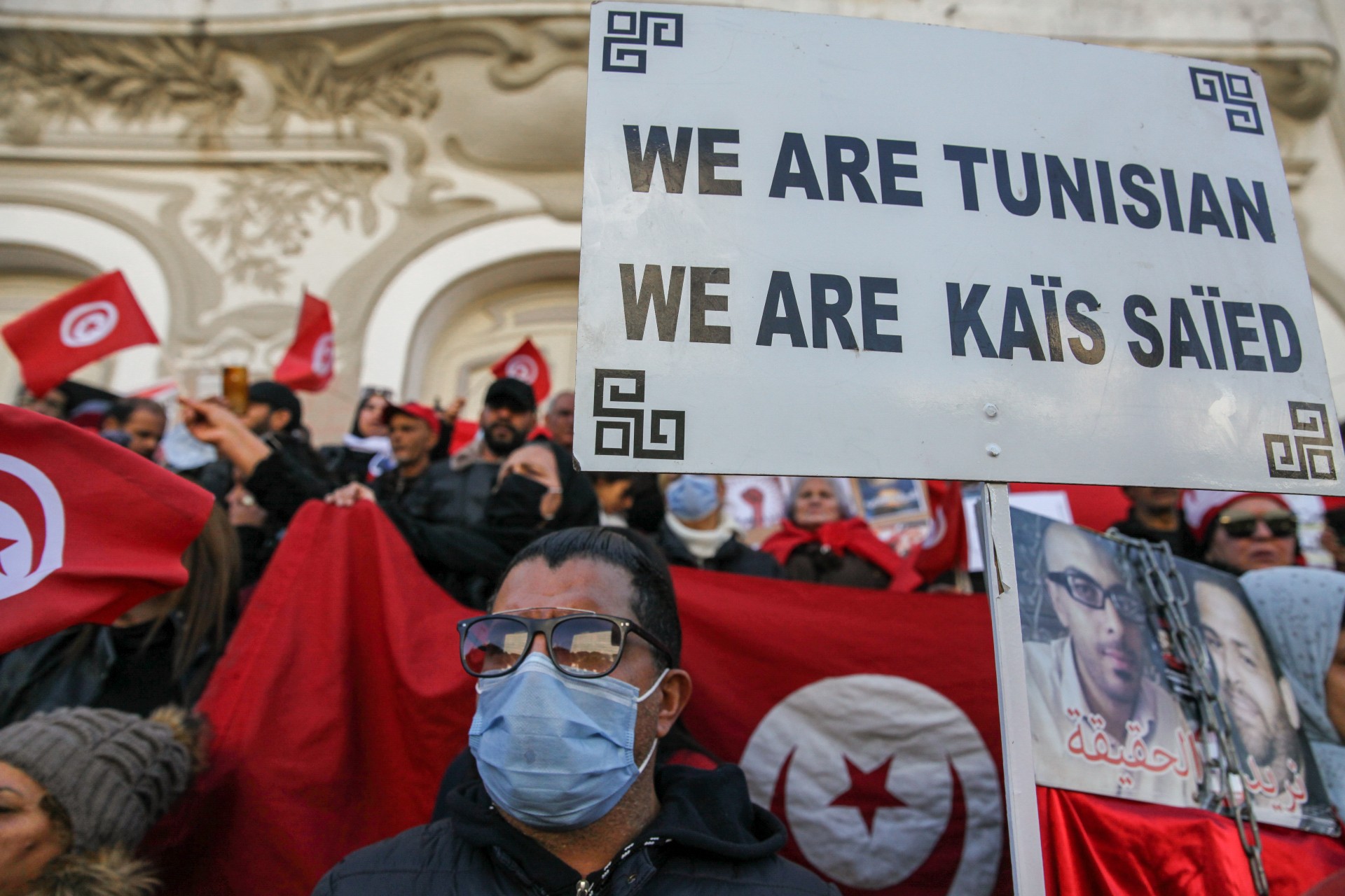 Supporters of President Kais Saied during a demonstration to commemorate the 11th anniversary of the outbreak of the Tunisian revolution and to support the president (Reuters)