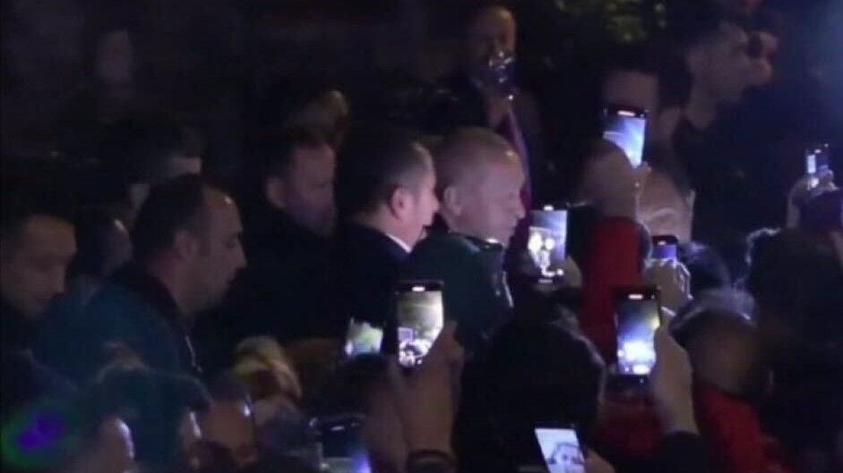 Footage on TV of Erdogan mixing with supporters in Istanbul (Screenshot)