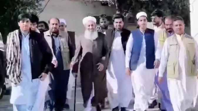 Molavi Abdolhamid often travels guarded by men in traditional Baloch outfits (Screengrab)