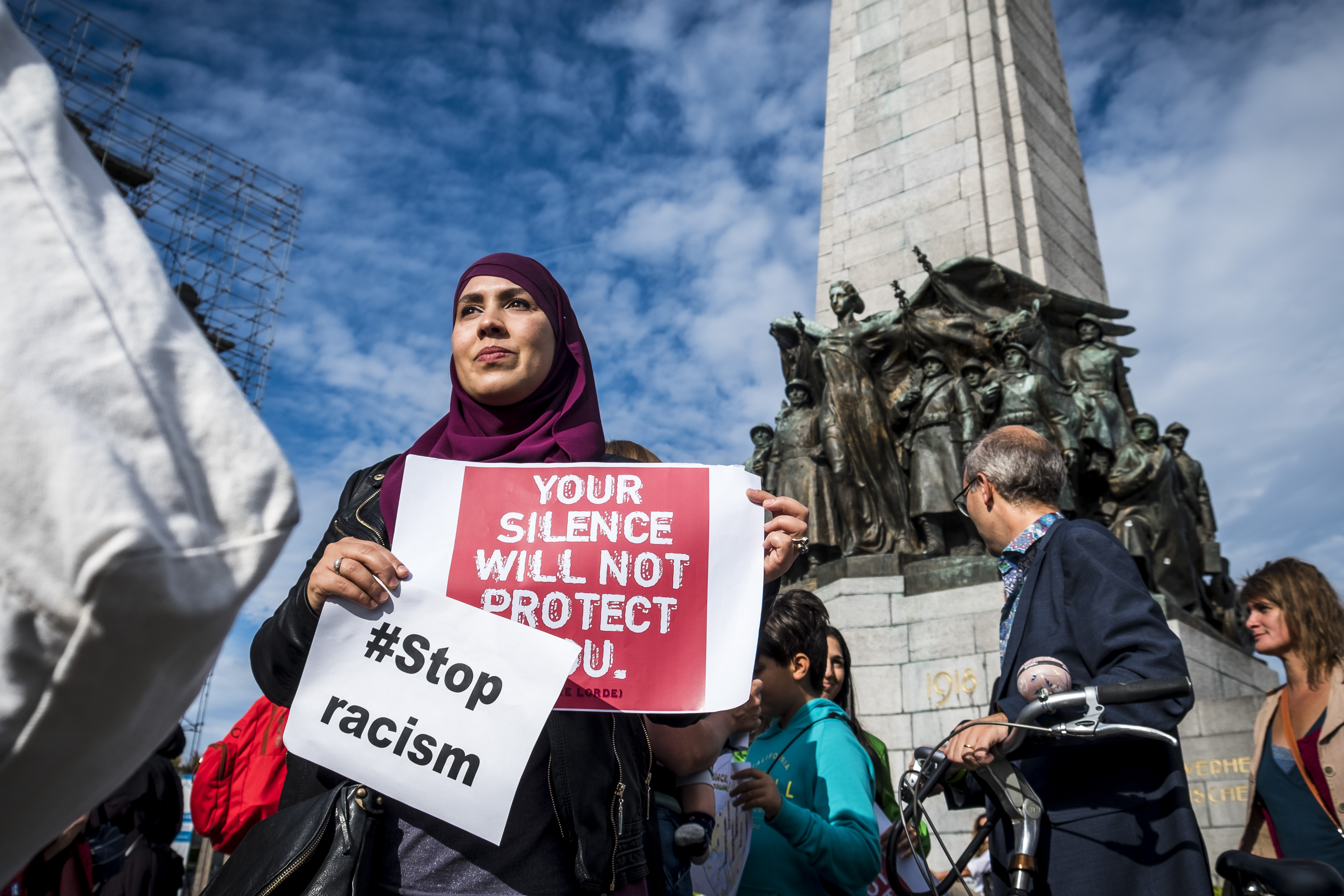 People hold posters as they protest against 'hate and islamophobia' in Brussels on September 9, 2018 (AFP)