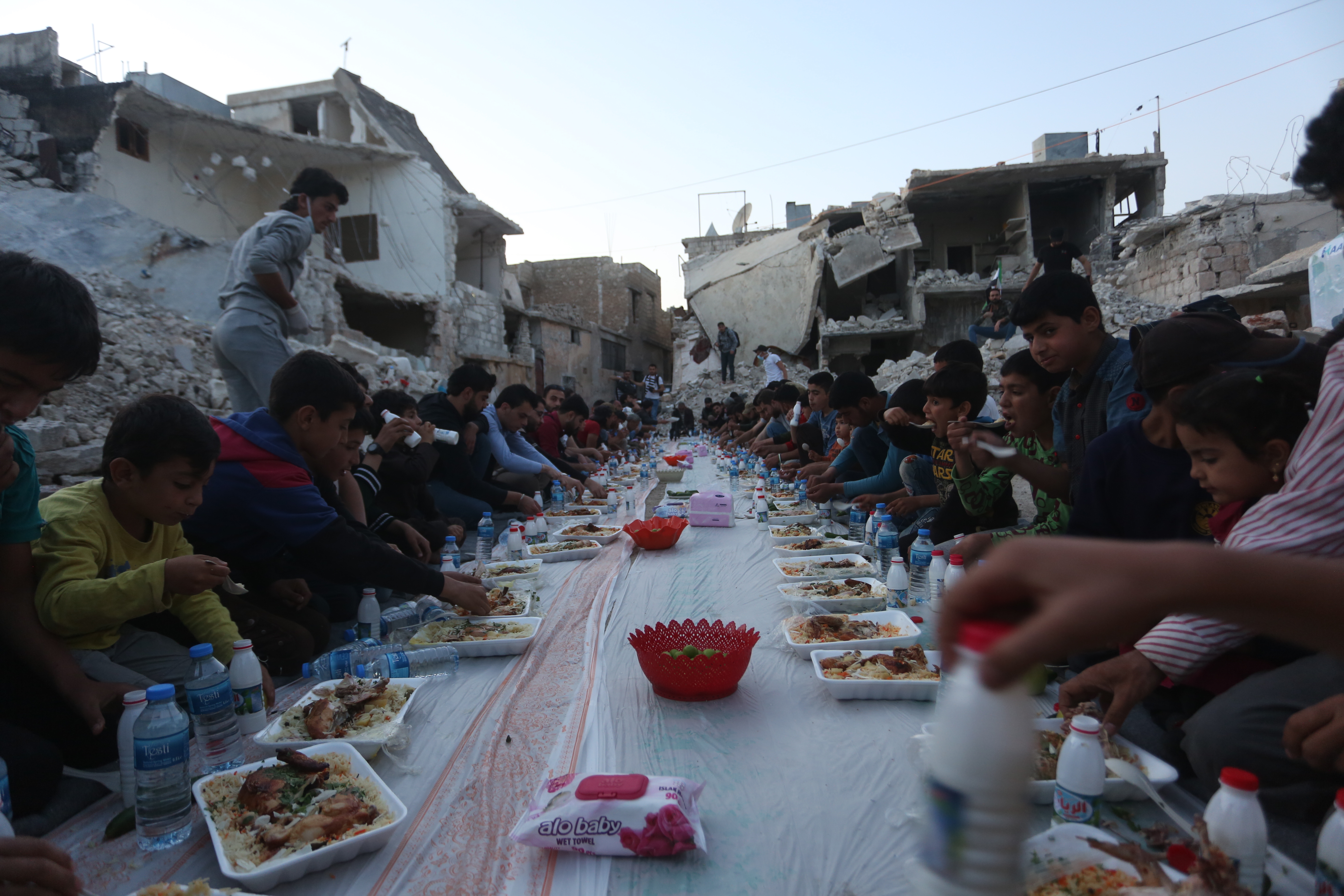 Iftar amid the rubble serves as a symbol of Syria's revolution | Middle