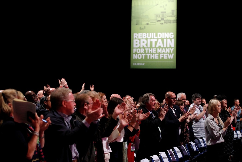 Delegates applaud at the Labour Party's conference in Liverpool (Reuters)