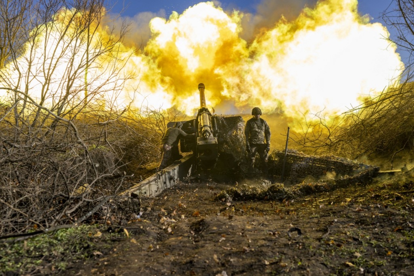 A Ukrainian soldier of an artillery unit fires towards Russian positions outside Bakhmut on November 8, 2022, amid the Russian invasion of Ukraine.