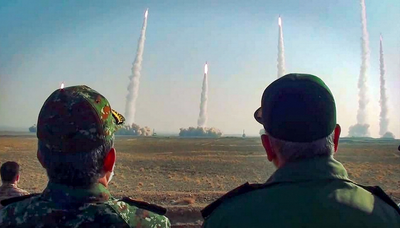 Head of Iran's Revolutionary Guard Corps (IRGC) Hossein Salami (R) watches a launch of missiles during a military and drone drill in central Iran on 15 January 2021 (FILE/IRGC Handout/SEPAH NEWS/AFP)