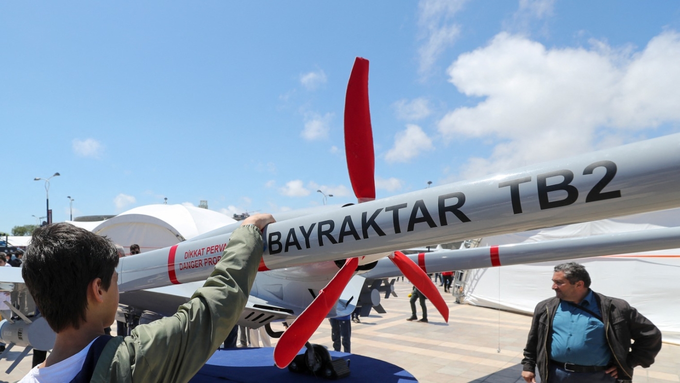 A young man looks at a Turkish-made Bayraktar TB2 drone during the opening of a aerospace and technology festival in Baku, Azerbaijan on 27 May 2022.