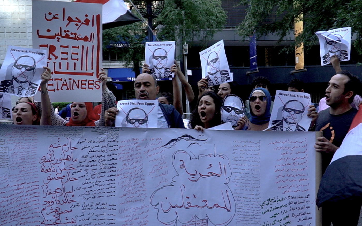 Activists compiled names of all 2,200 detainees on a banner and demand for their release  [MEE/Azad Essa]