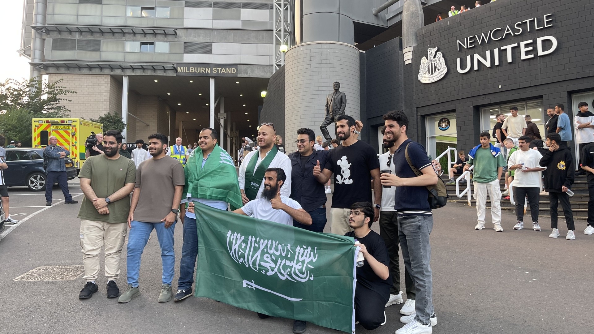 Saudi football fans pose ahead of the international friendly football match between Saudi Arabia and Costa Rica at St James' Park in Newcastle, England, on 8 September 2023 (MEE/Rayhan Uddin)