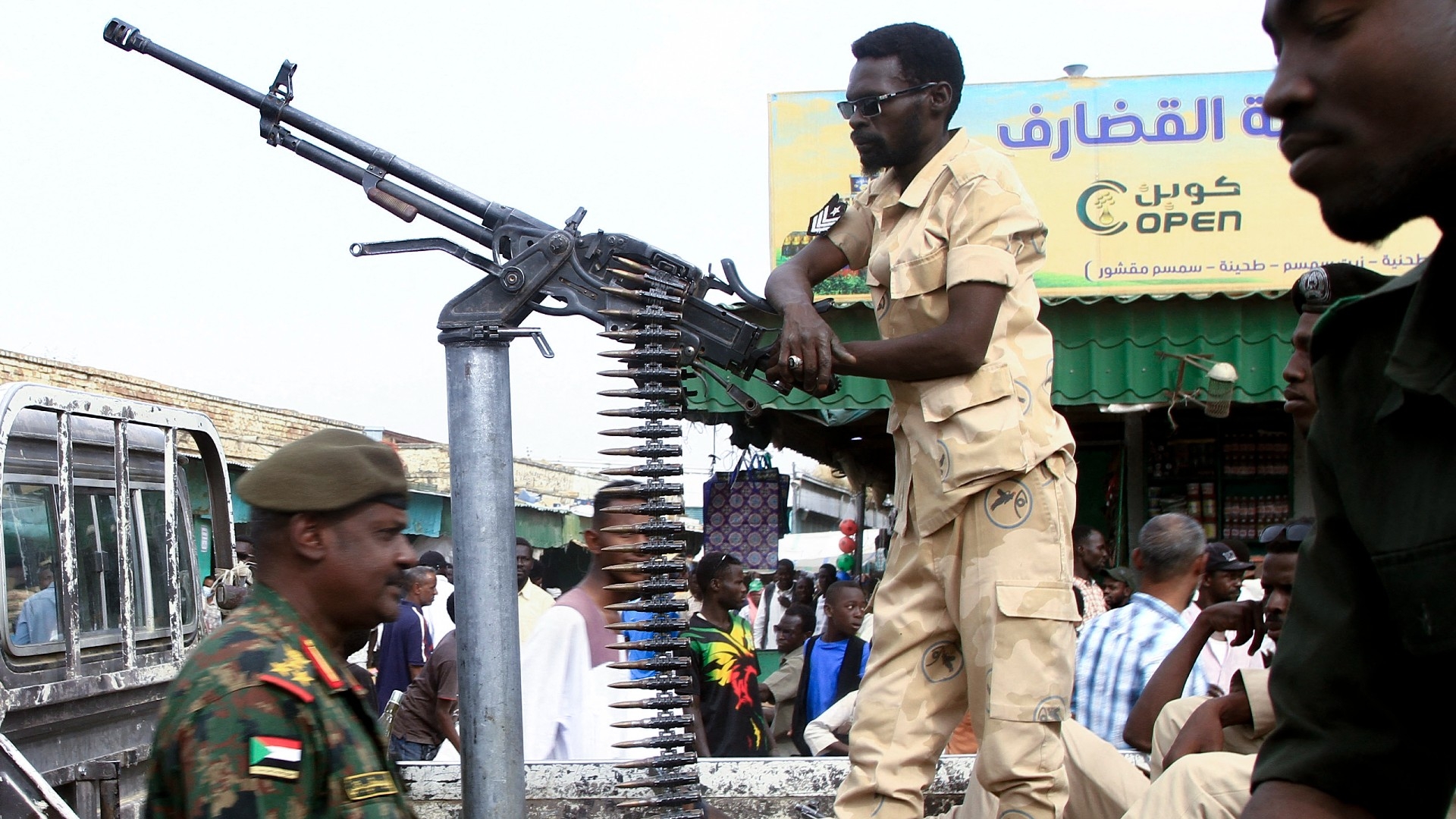 Sudanese security forces patrol in a commercial district in the city of Gedaref in eastern Sudan on 3 April 2024 (AFP)