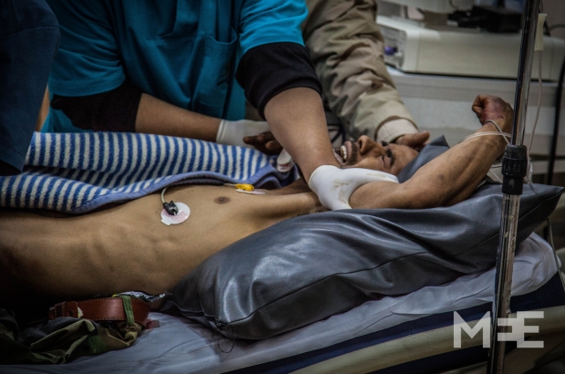 A soldier wounded in Sabri is treated at al-Jalaa hospital (MEE/Hassan Morajea)