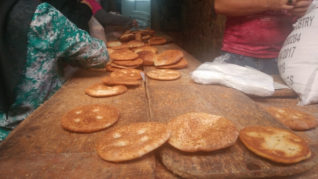 The smell of bread from bakeries tucked into the sides of ancient alleyways point to a lively city (MEE/Ali Harb)