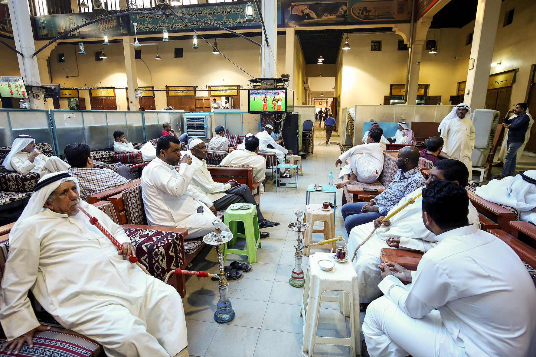 People sit in a Cafe in Kuwait (AFP/Yasser al-Zayyat)
