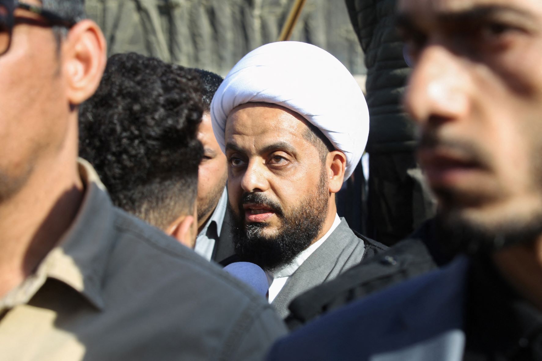 Qais al-Khazali, leader of Asaib Ahl al-Haq faction, attends the funeral procession of Hashed al-Shaabi fighters in Baghdad on December 31, 2019 (AFP) 