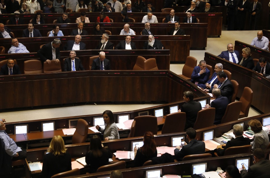 The Knesset holds a session in Jerusalem on 26 December (AFP)