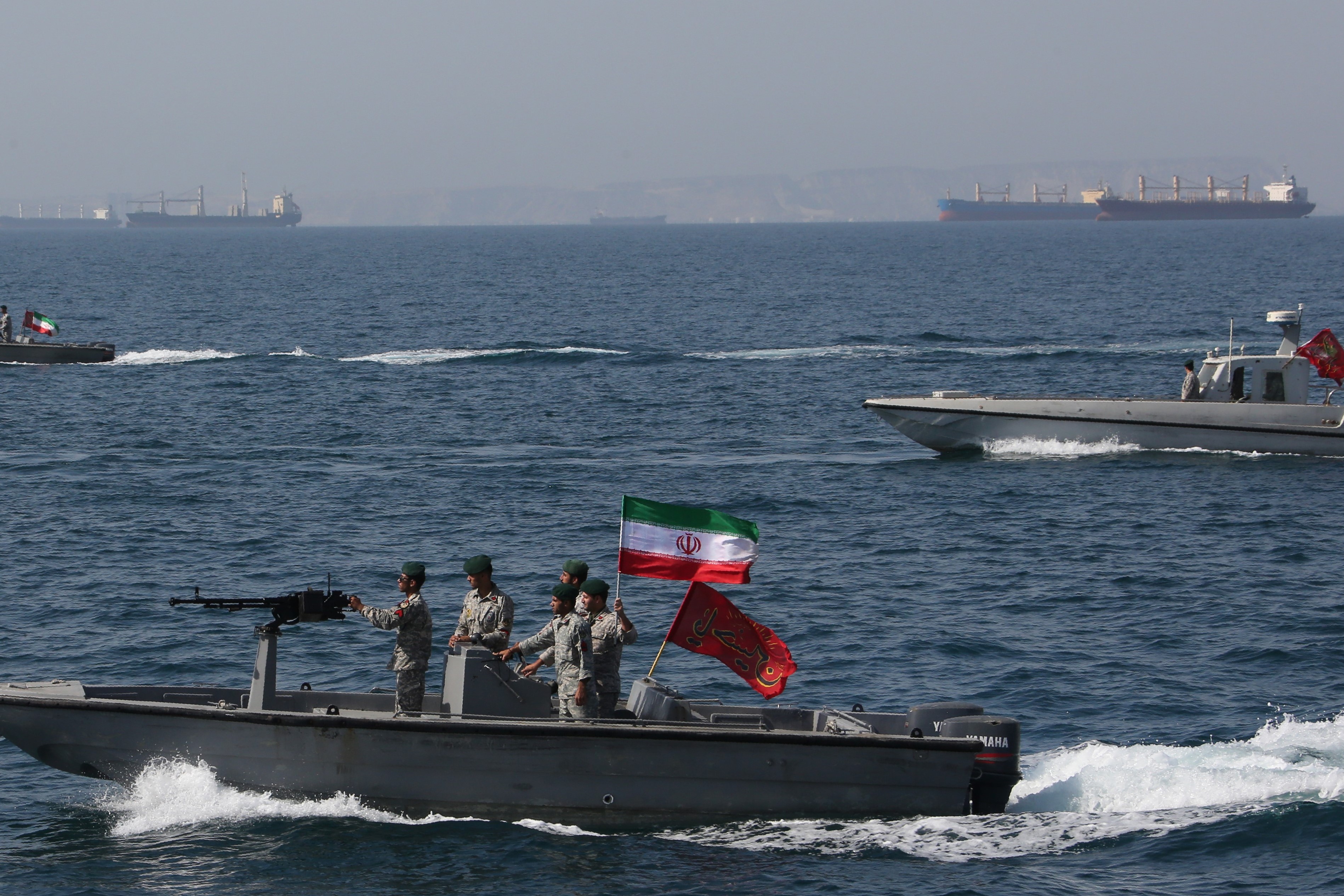 In this file photo taken on April 30, 2019, Iranian soldiers take part in the "National Persian Gulf day" in the Strait of Hormuz (AFP)