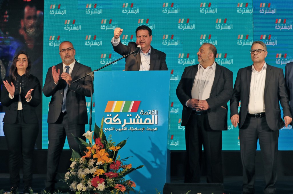 Ayman Odeh (C), leader of the Hadash party that is part of the Joint List alliance, gives an address with other alliance leaders at their electoral headquarters in Israel's northern city of Shefa-Amr on March 2, 2020, 