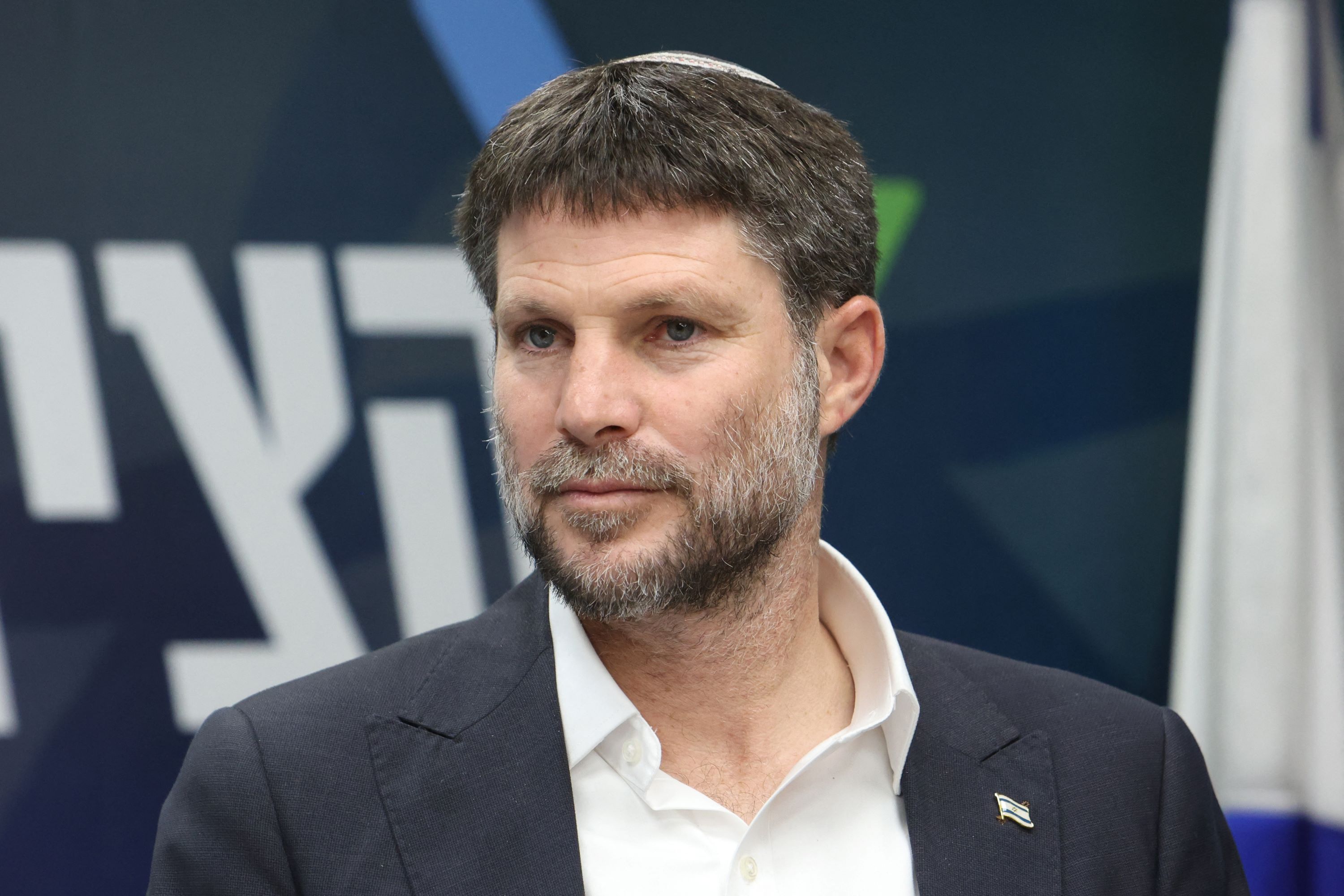 Israel's Finance Minister and leader of the Religious Zionist Party Bezalel Smotrich attends a meeting at the parliament, Knesset, in Jerusalem on March 20, 2023 (AFP)