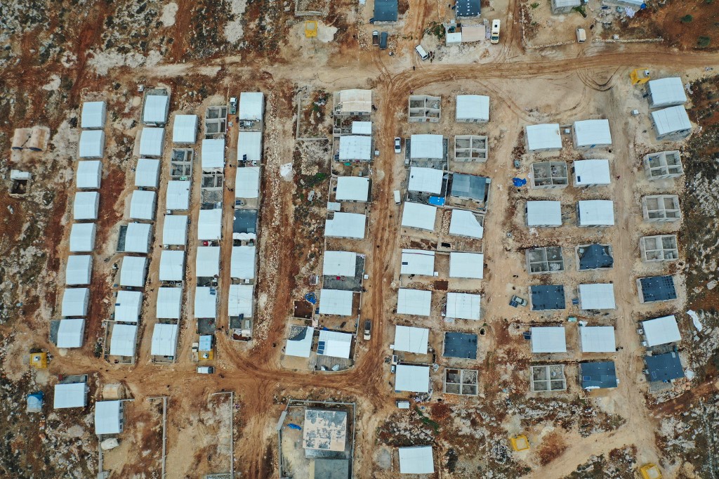 Millions of displaced people who fled government bombardment live in overcrowded displacement camps in Idlib (AFP)