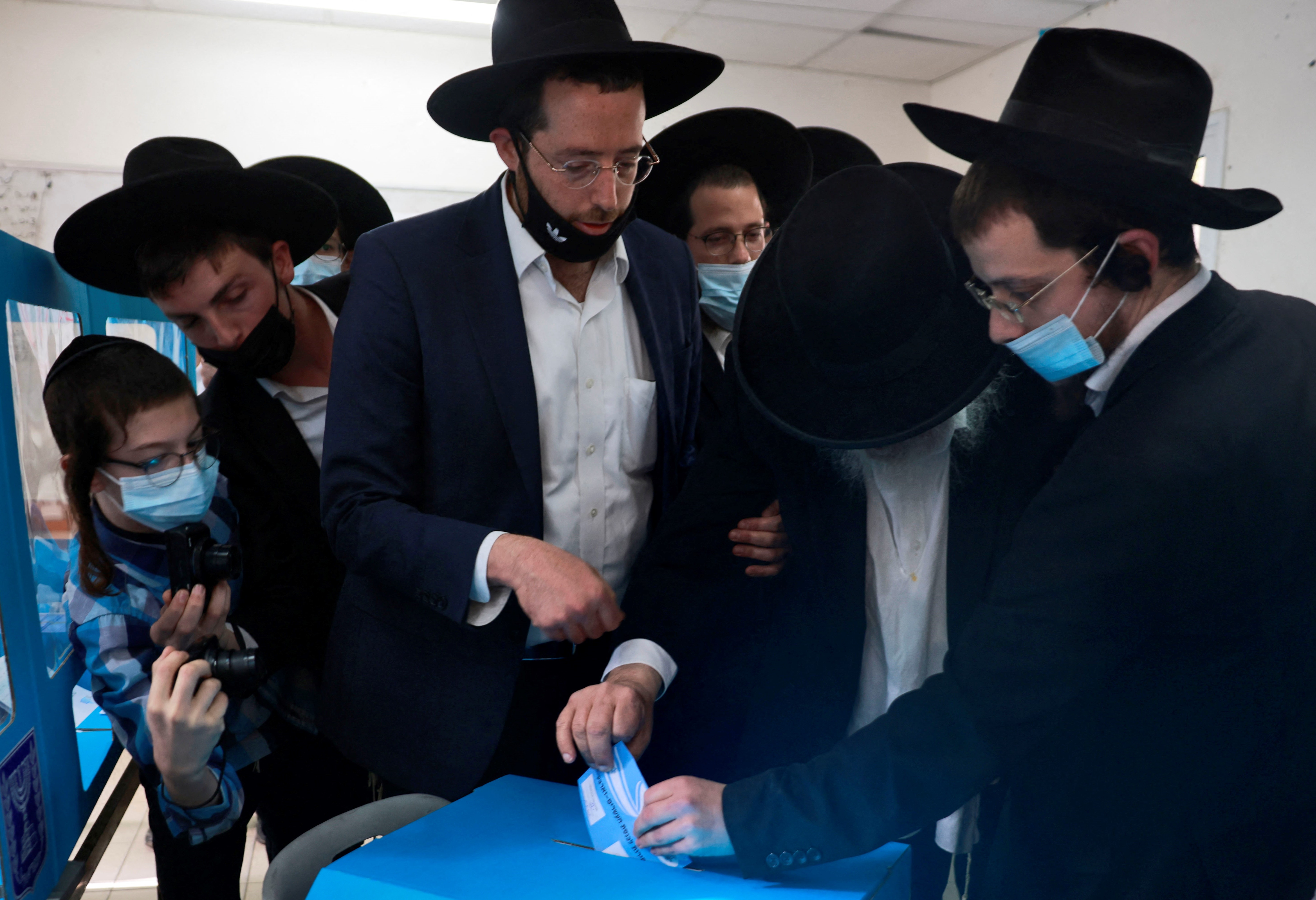 Religious Israelis cast their ballots on March 23, 2021 in the mostly Jewish ultra-Orthodox city of Bnei Brak on the fourth national election in two years.