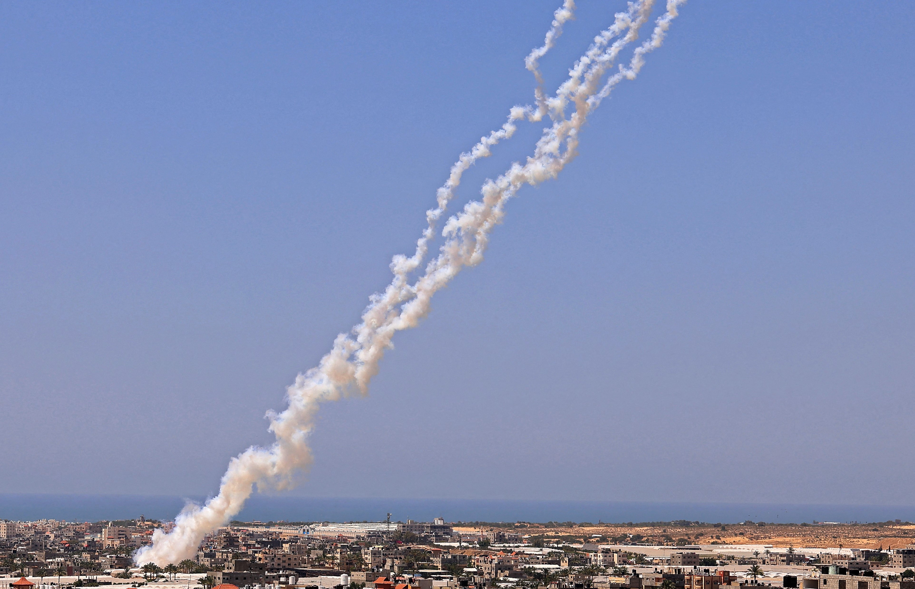 Rockets are launched towards Israel from Rafah, in the south of the Gaza Strip, controlled by the Palestinian Hamas movement, on May 12, 202