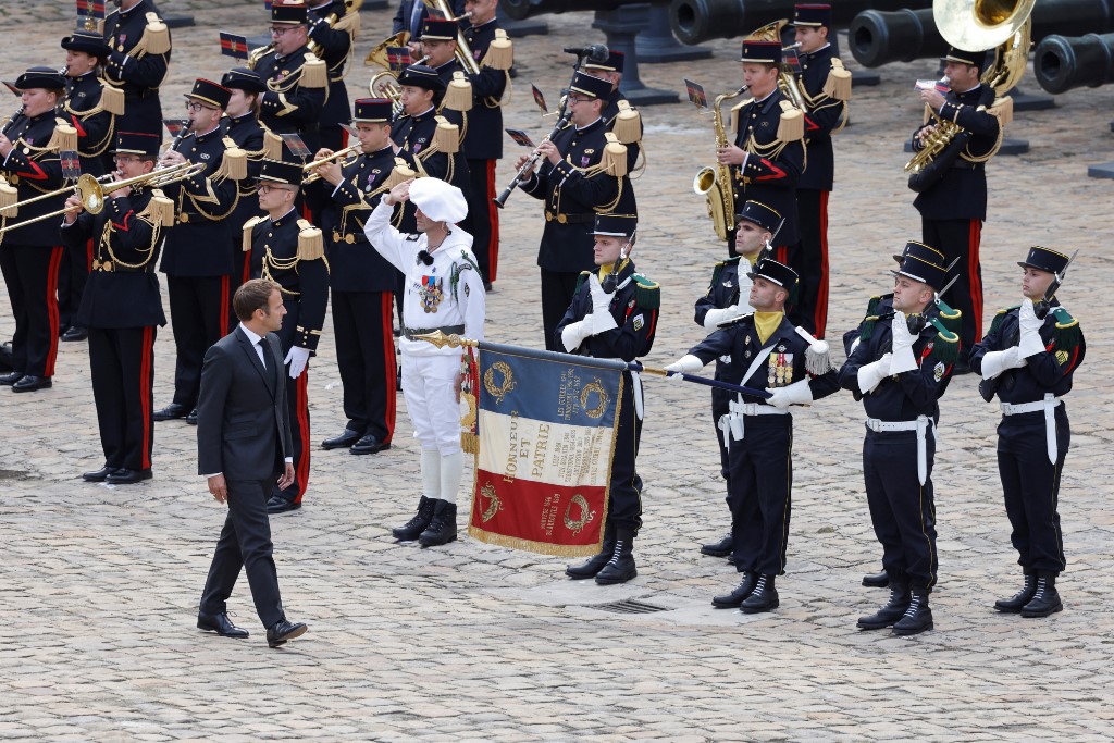 Emmanuel Macron reviews troops