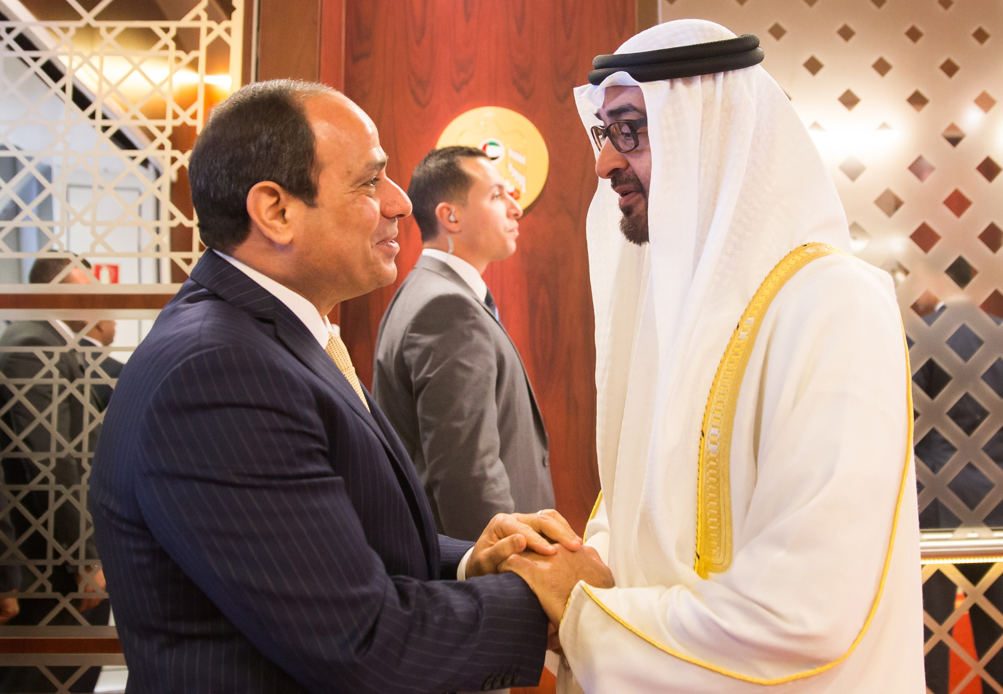 Sheikh Mohamed bin Zayed Al Nahyan Crown Prince of Abu Dhabi and Deputy Supreme Commander of the UAE Armed Forces (R) receiving Egyptian President Abdel Fattah al-Sisi in the Emirati capital