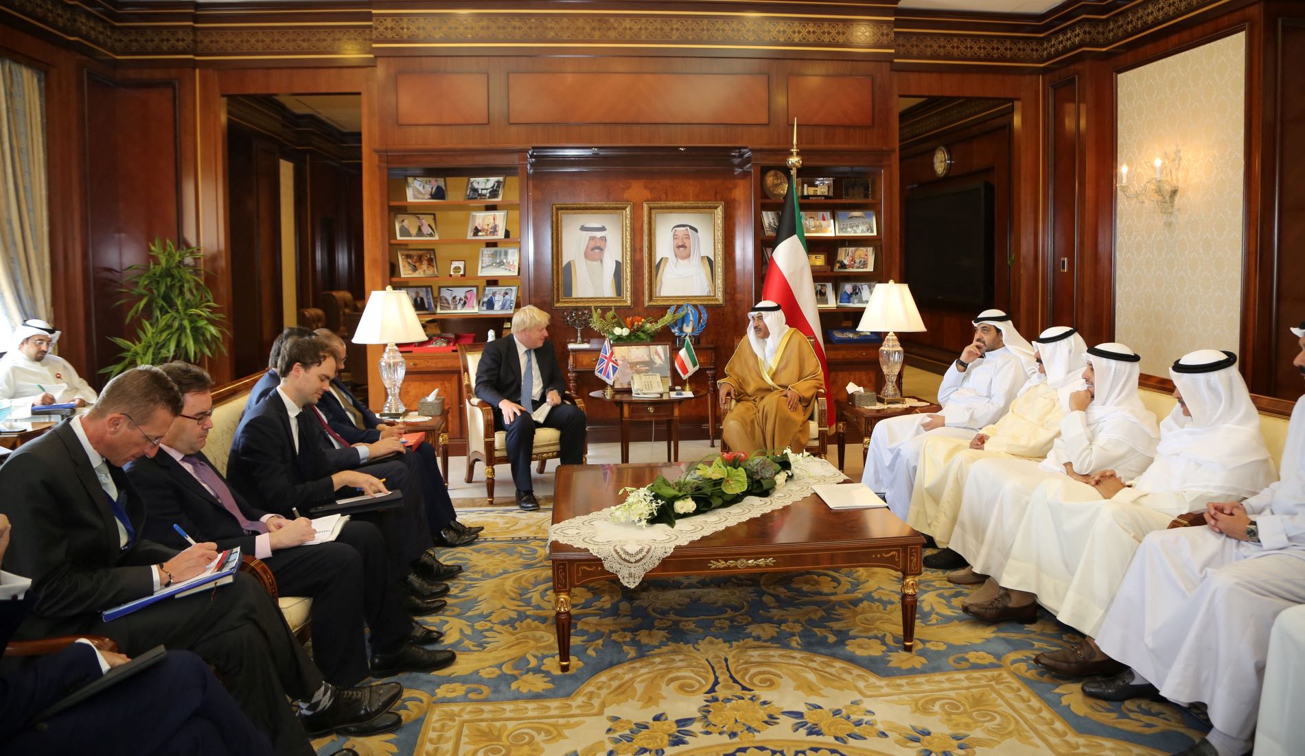 A handout picture released by Kuwait's news agency KUNA on July 8, 2017, shows the Kuwaiti Foreign Minister Sheikh Sabah al-Khaled al-Sabah (C-R) meeting his British counterpart Boris Johnson (AFP)