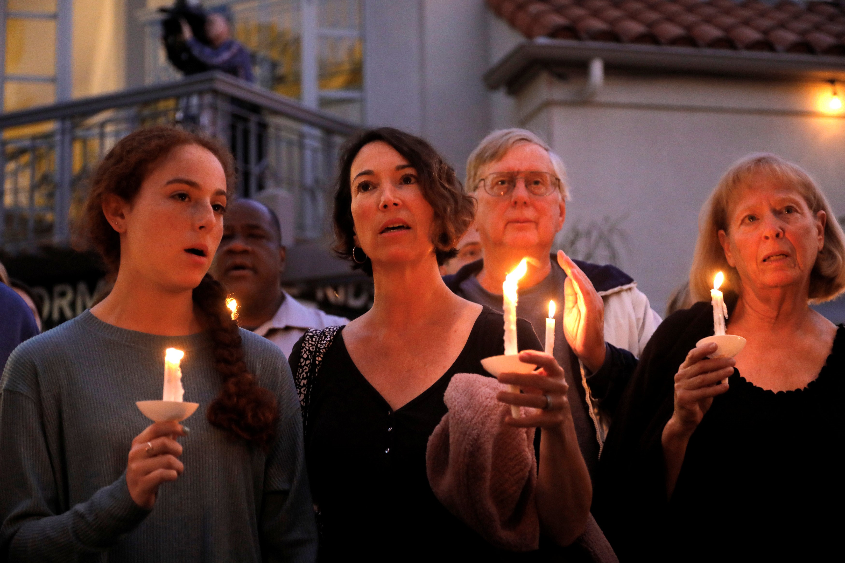   A candlelight vigil is held at Rancho Bernardo Community Presbyterian Church for victims of a shooting incident at the Congregation Chabad synagogue in Poway on 27 April (Reuters)