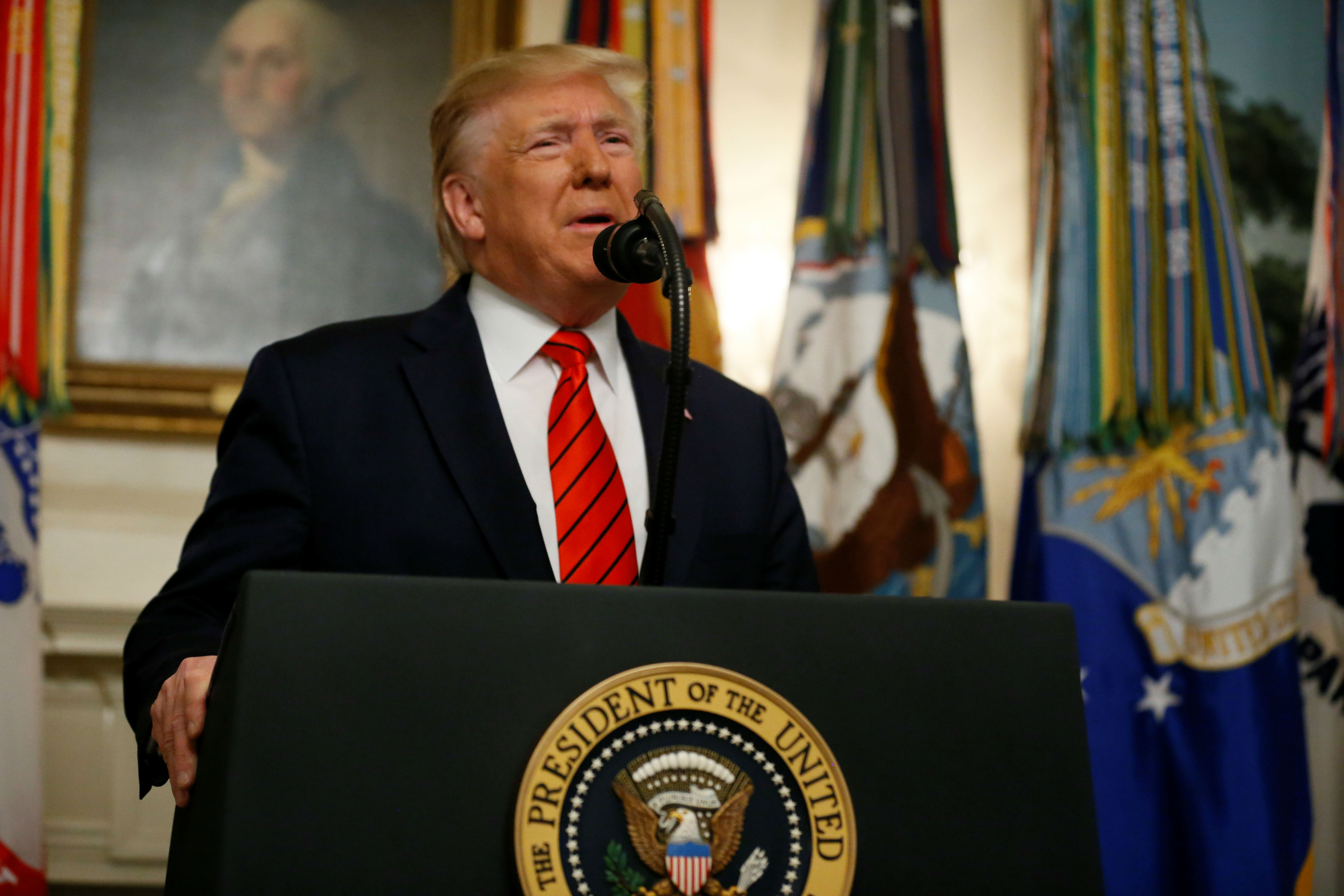 Donald Trump makes a statement at the White House following reports that US forces attacked Islamic State leader Abu Bakr al-Baghdadi in northern Syria (Reuters)