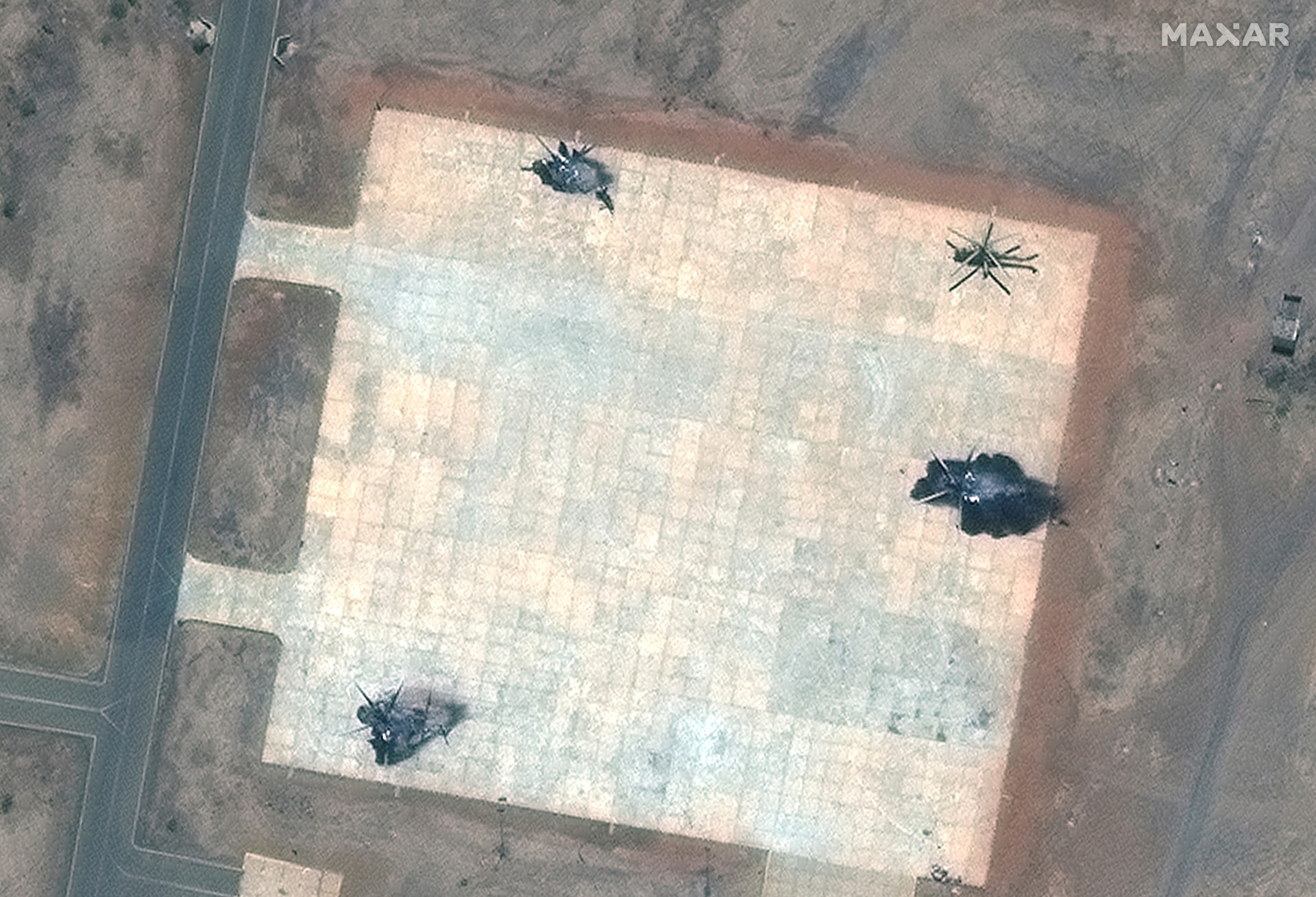 Satellite image shows a close up view of destroyed helicopters in South Khartoum, Sudan, 18 April (Reuters)