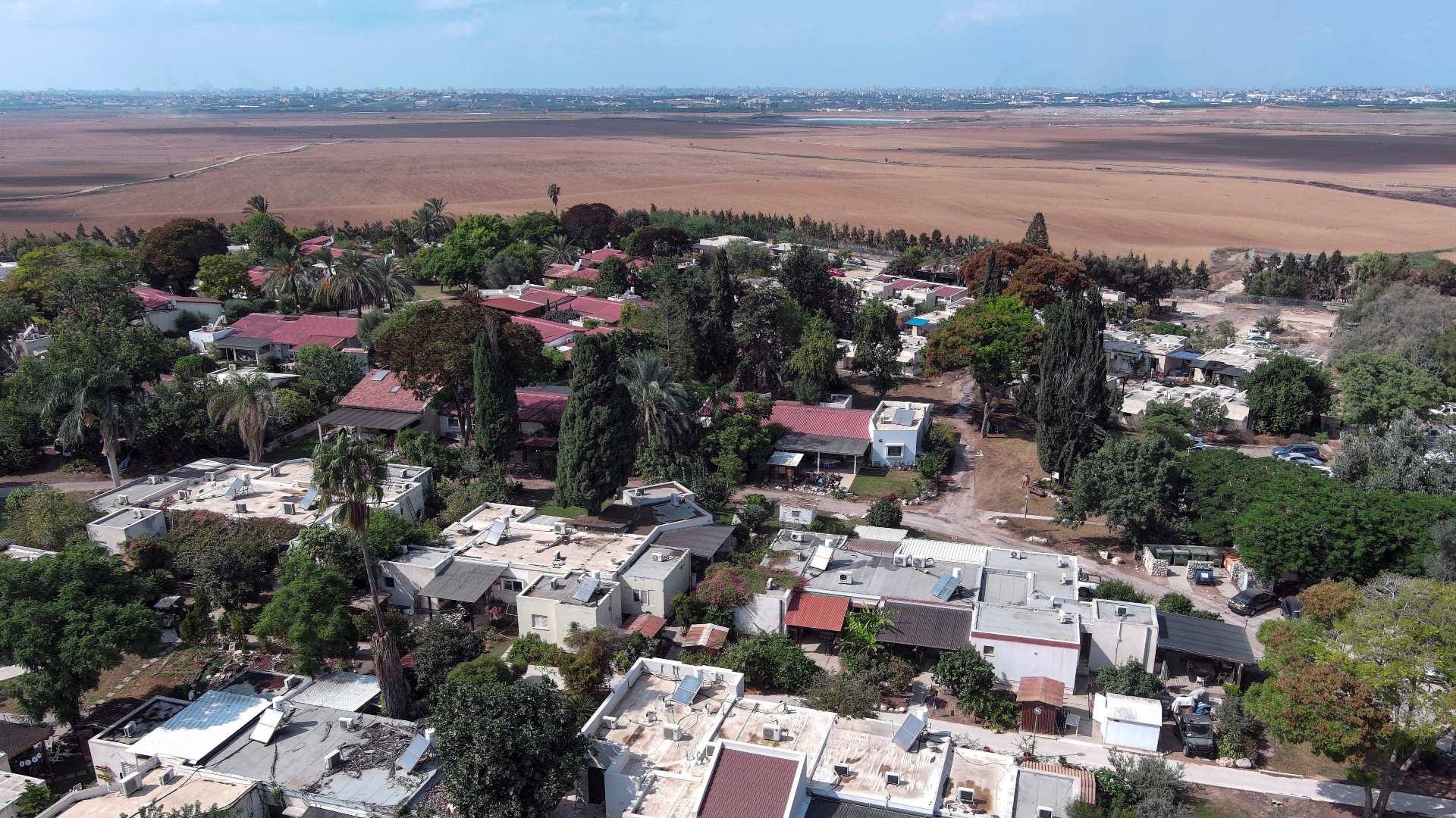 An aerial view shows Kibbutz Krar Aza on 10 October (Reuters)