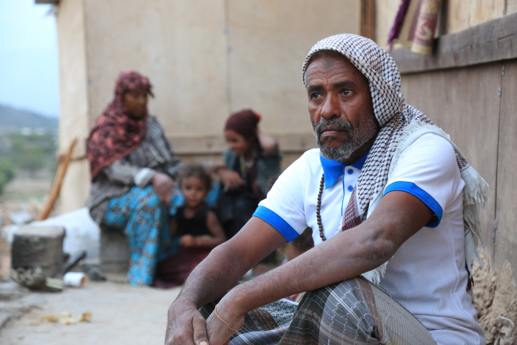 Surviving on aid, Abdu Hassan says, "is the situation of the majority of people here, not just mine" (MEE/Khalid al-Banna)
