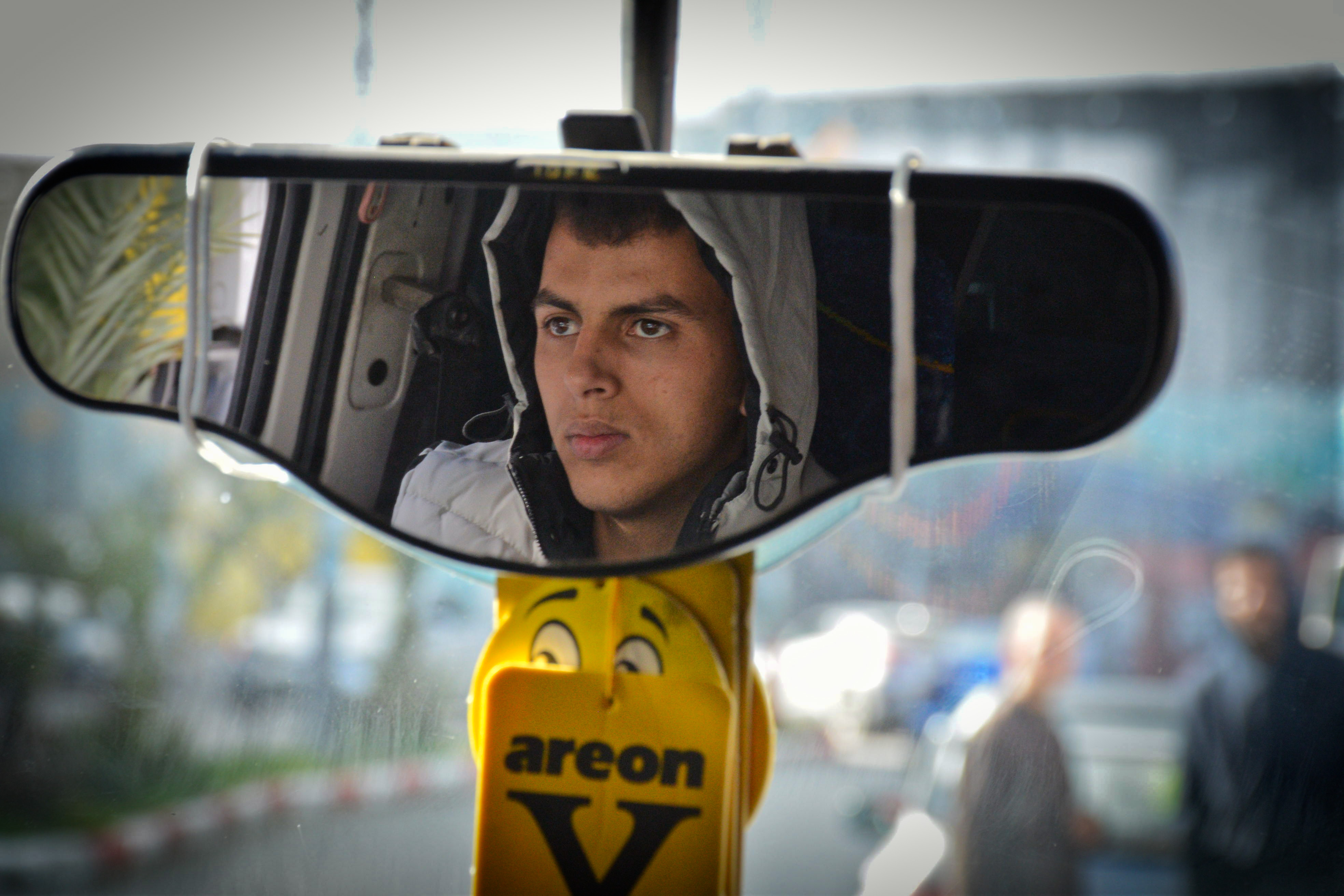 Islam Rabea driving his minibus (MEE/Qassem Maaddi)