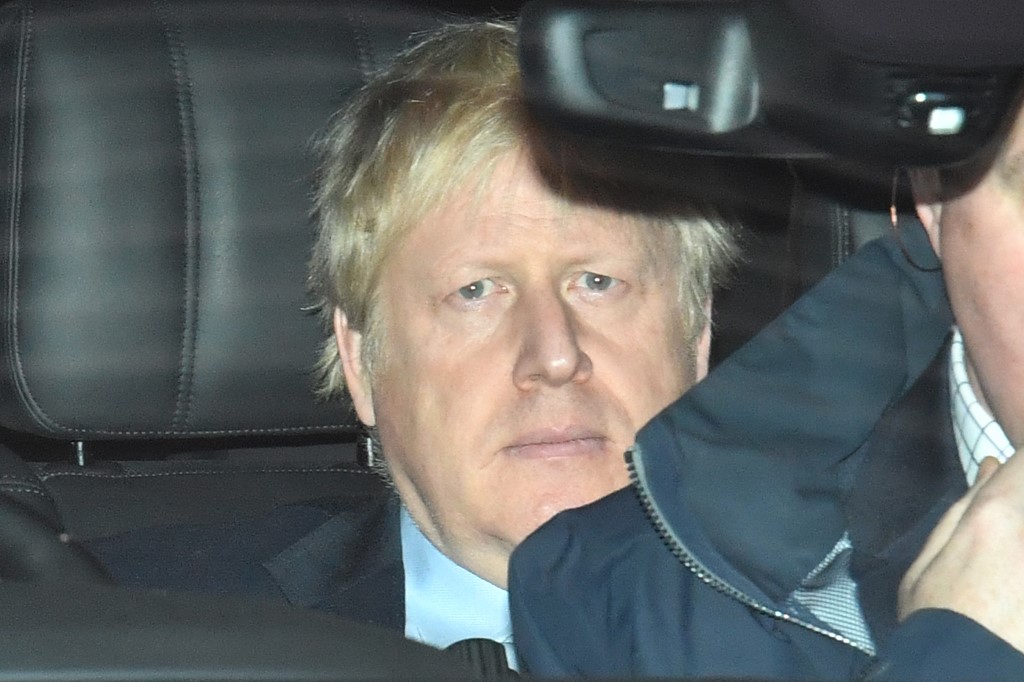 Britain's then-Prime Minister Boris Johnson leaves the BBC studios in London on 1 December 2019, 11 days before he went on to win a landslide victory at the general election (AFP)