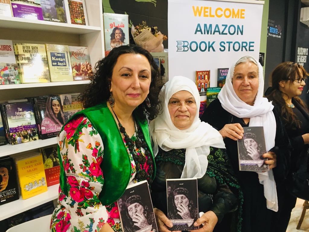 Houzan Mahmoud (L) with contributors Mother Sabria (C) and Nazanin Hassan (R) at the book launch in Sulaymaniyah, November 2019 (Houzan Mahmoud)
