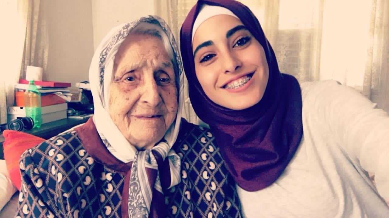 Rifqa al-Kurd with her granddaughter, Mona al-Kurd, at their house in Sheikh Jarrah (Supplied)