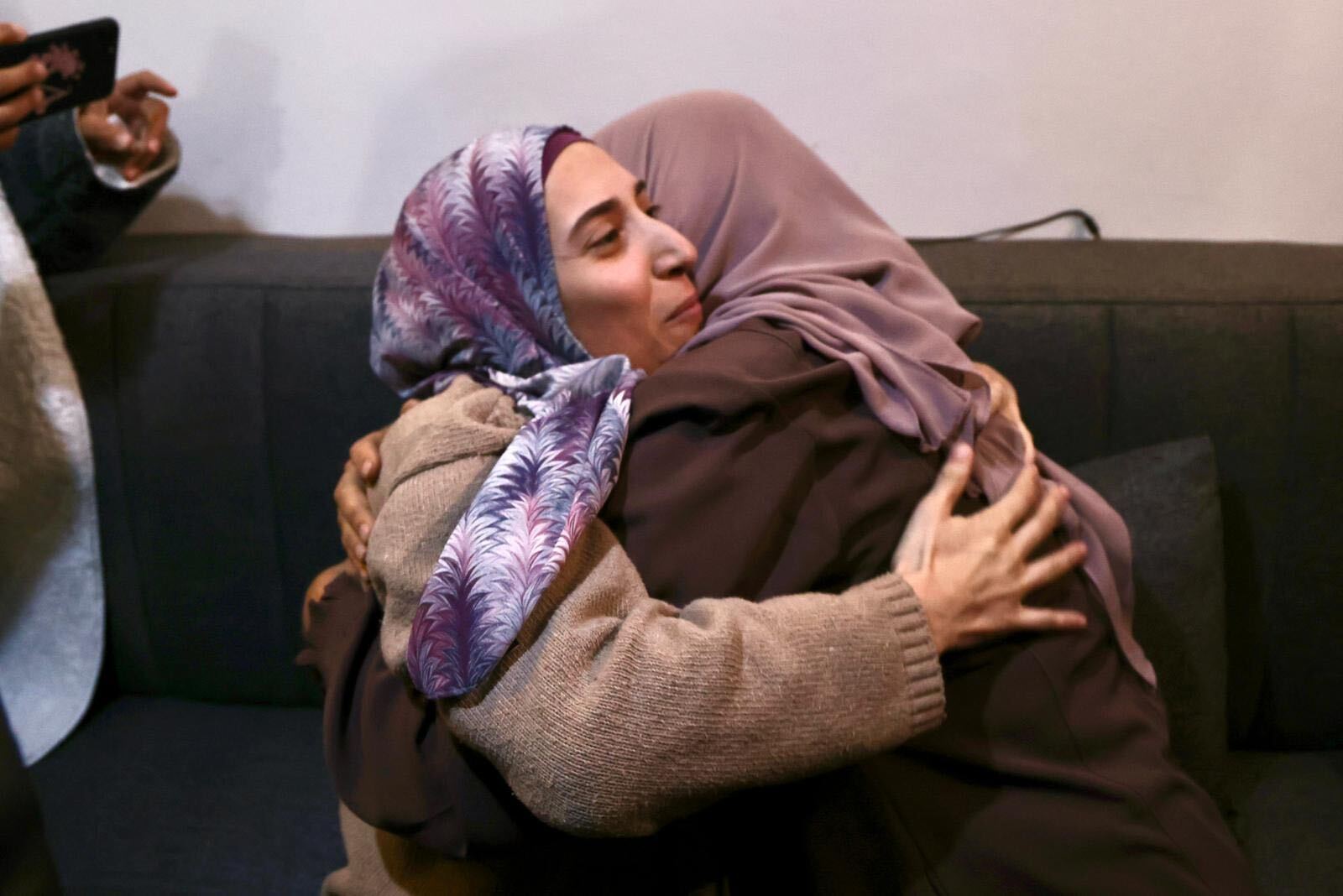 Shorouq Dwayyat is reunited with her mother (MEE/Faiz Abu Rmeleh)