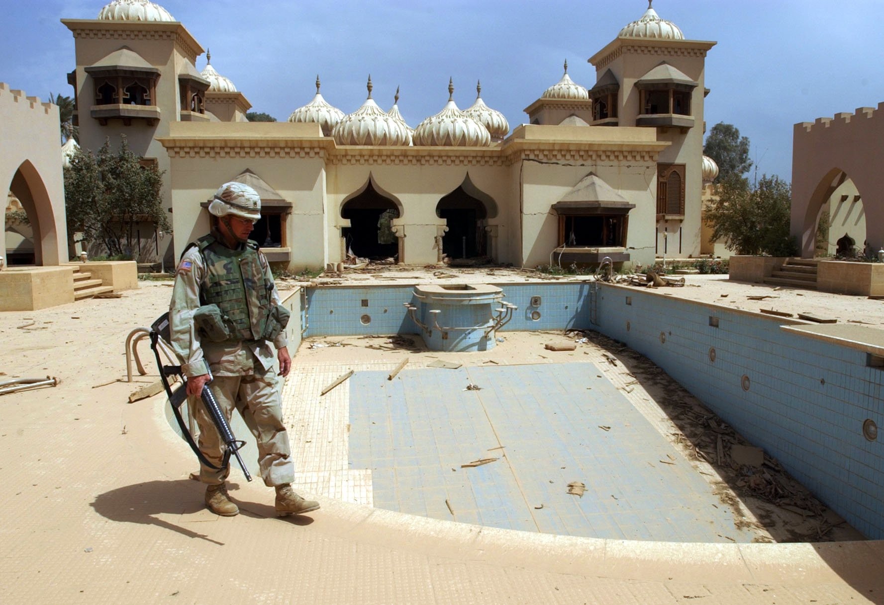 A US soldier a villa in Saddam Hussein's palace complex on the banks of the river Tigris in Baghdad in April 2003 (Peter Nicholls/The Times)