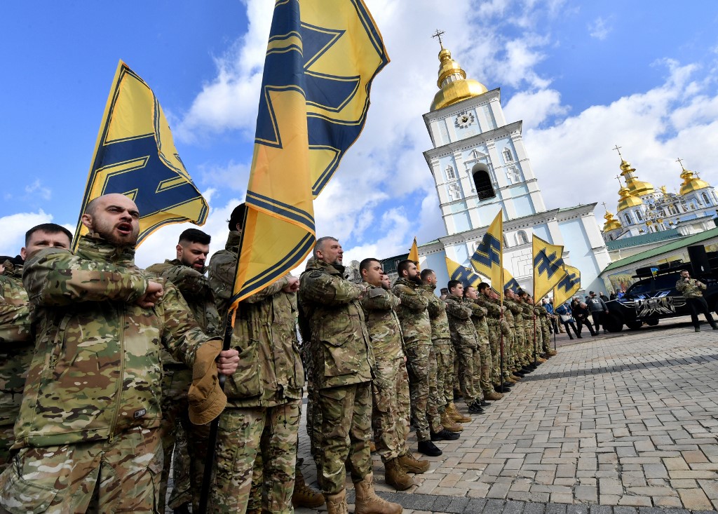Veterans of Ukraine's far-right Azov volunteer battalion during a rally called 'No surrender' in Kyiv on 14 March 2020 (AFP)