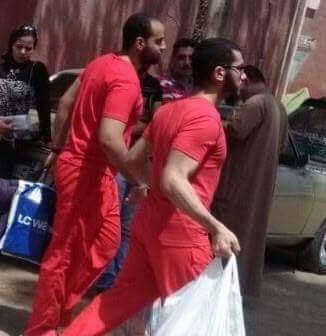 Ahmed el-Shal (R) in a death row uniform (MEE/Courtesy Nusela Harun)