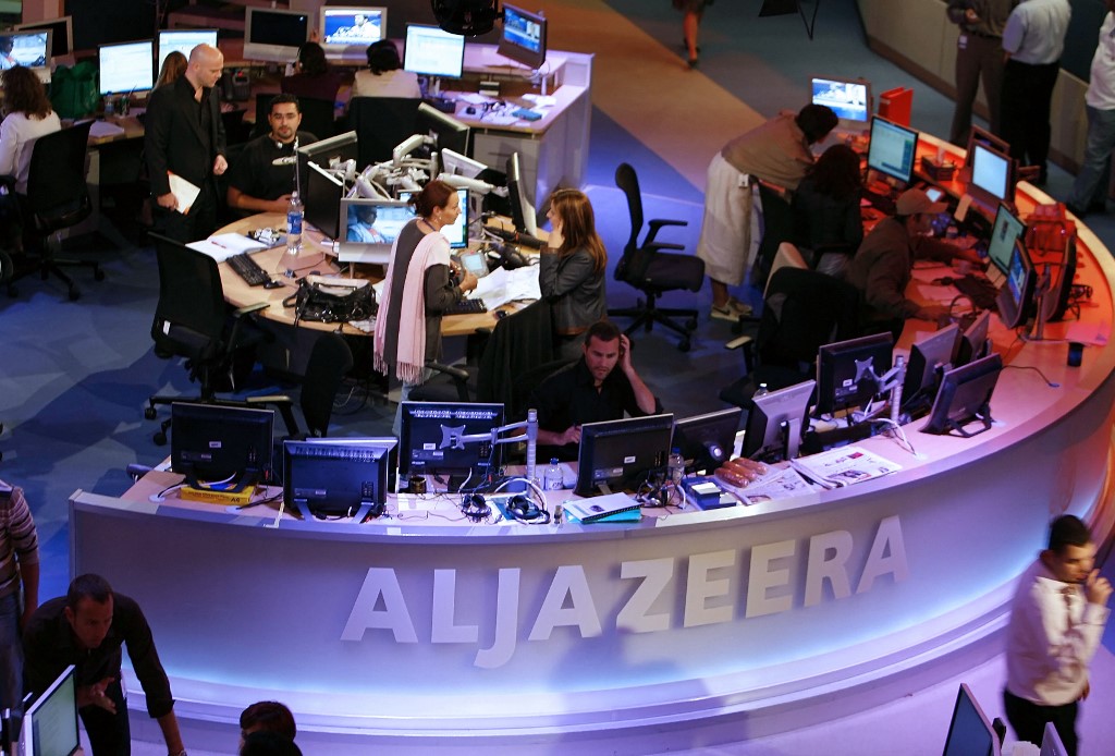Al Jazeera’s Doha newsroom is pictured in 2006 (AFP)