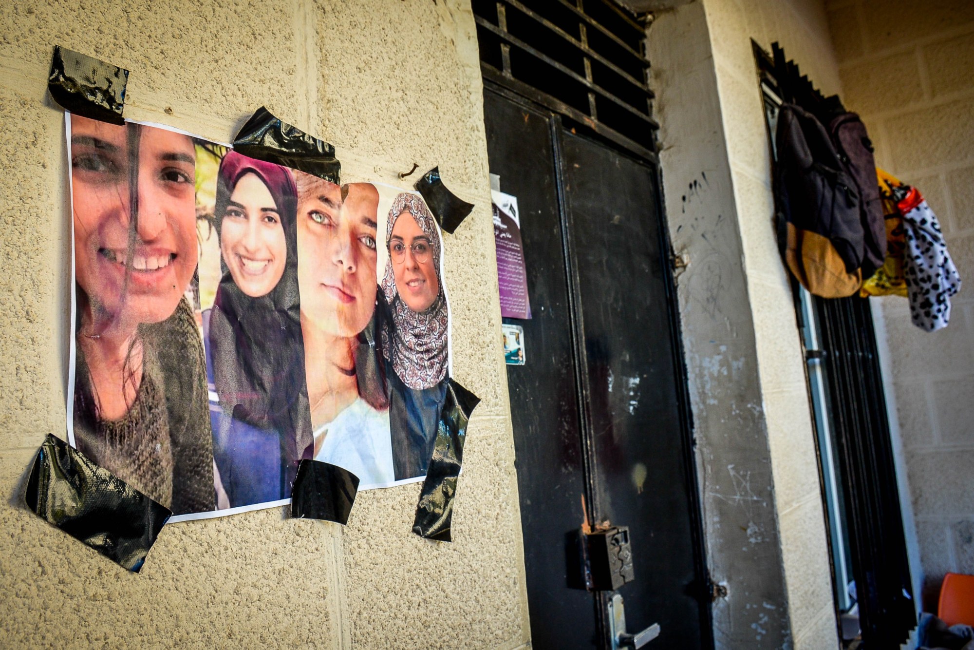 Photographs of detained students are displayed on the Birzeit University campus (MEE/Qassam Muaddi)