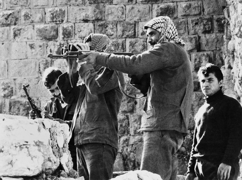 Palestinians fedayins keep a watch on the surroundings of the Ajloun castle where they have taken up position, on December 22, 1970, 
