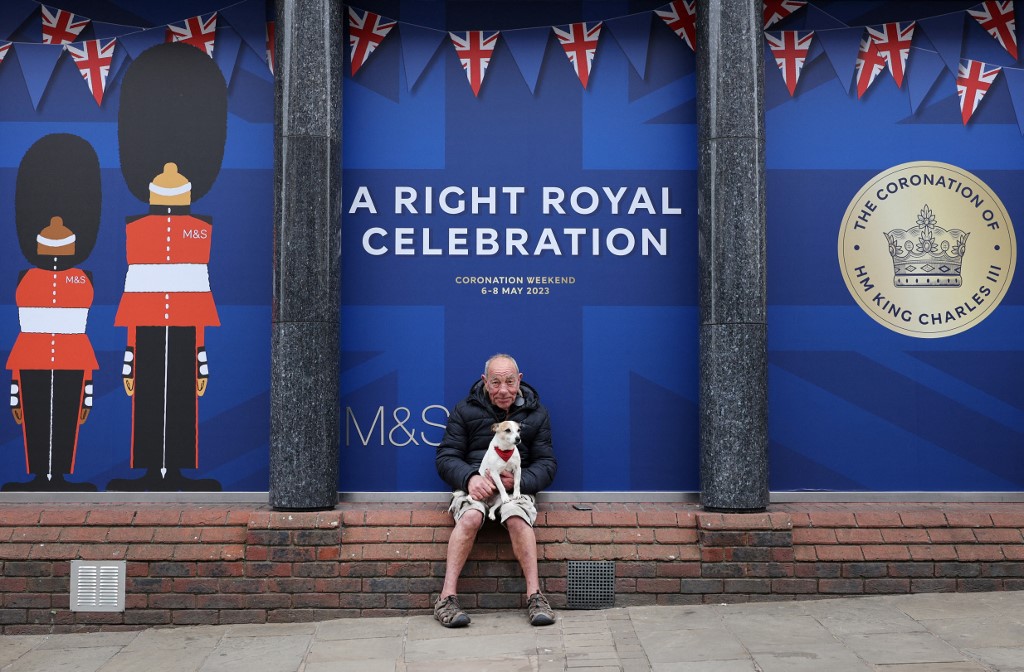 A decorated window in Windsor is seen on 2 May 2023, ahead of the coronation ceremony of King Charles III (AFP)