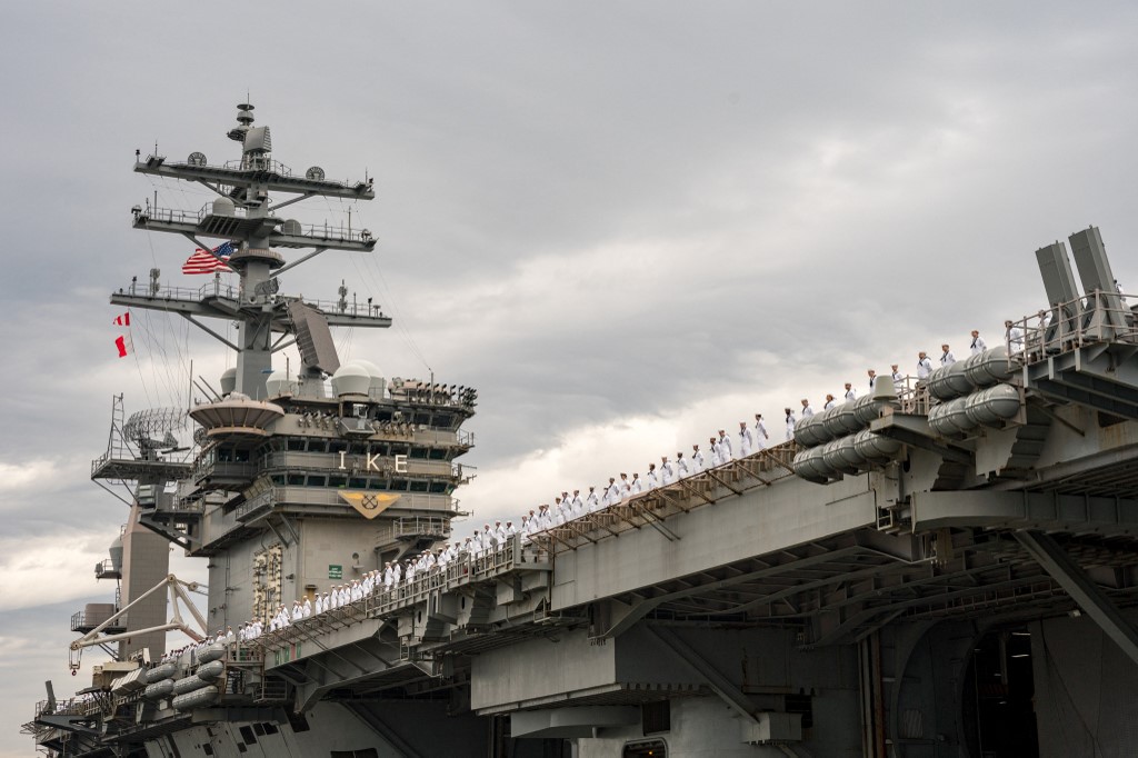 The USS Eisenhower and its affiliated warships have been sent to the eastern Mediterranean to signal Washington's 'ironclad commitment to Israel's security'. 