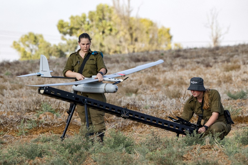 An Israeli soldier prepares an Elbit Systems Skylark I unmanned aerial vehicle (UAV or drone) for take-off near the border with the Gaza Strip in southern Israel on August 21, 2020, as part of monitoring operations in the area.