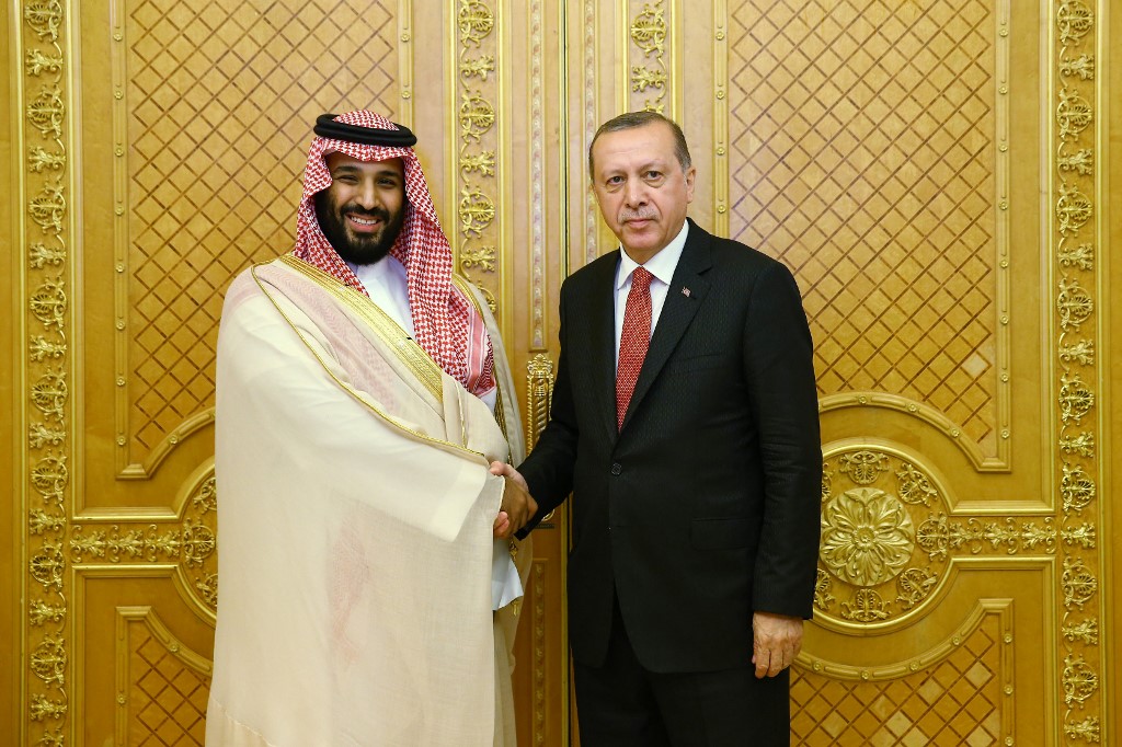 Turkish President Recep Tayyip Erdogan shakes hands with Saudi Crown Prince Mohammed bin Salman in Jeddah in July 2017 (Turkish Presidential Press Service/AFP)