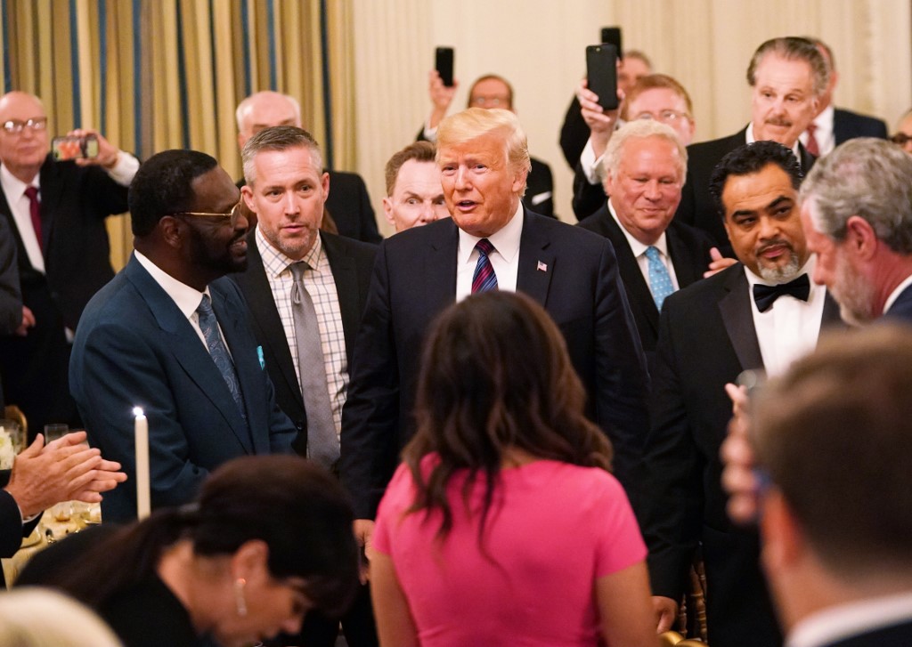 Trump attends an event honouring evangelical leaders in Washington in 2018 (AFP)