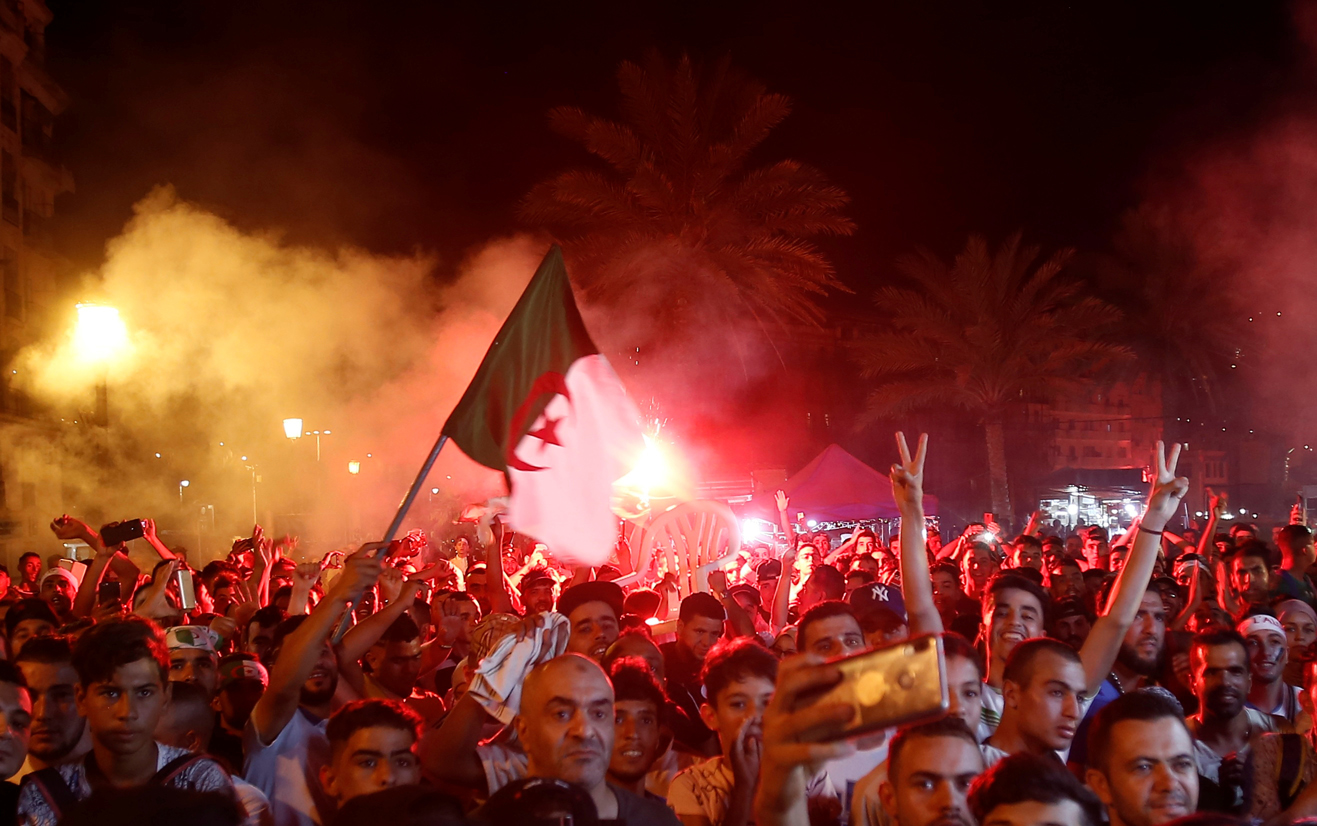 Fans in capital Algiers celebrate Algeria's victory in African Cup of Nations (Reuters)